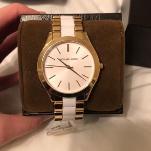 Women’s Michael Kors white and gold watch
